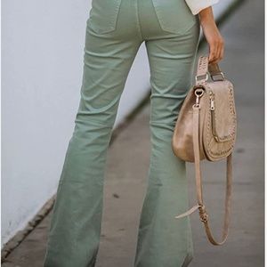 Distressed bell bottom green denim pant Medium